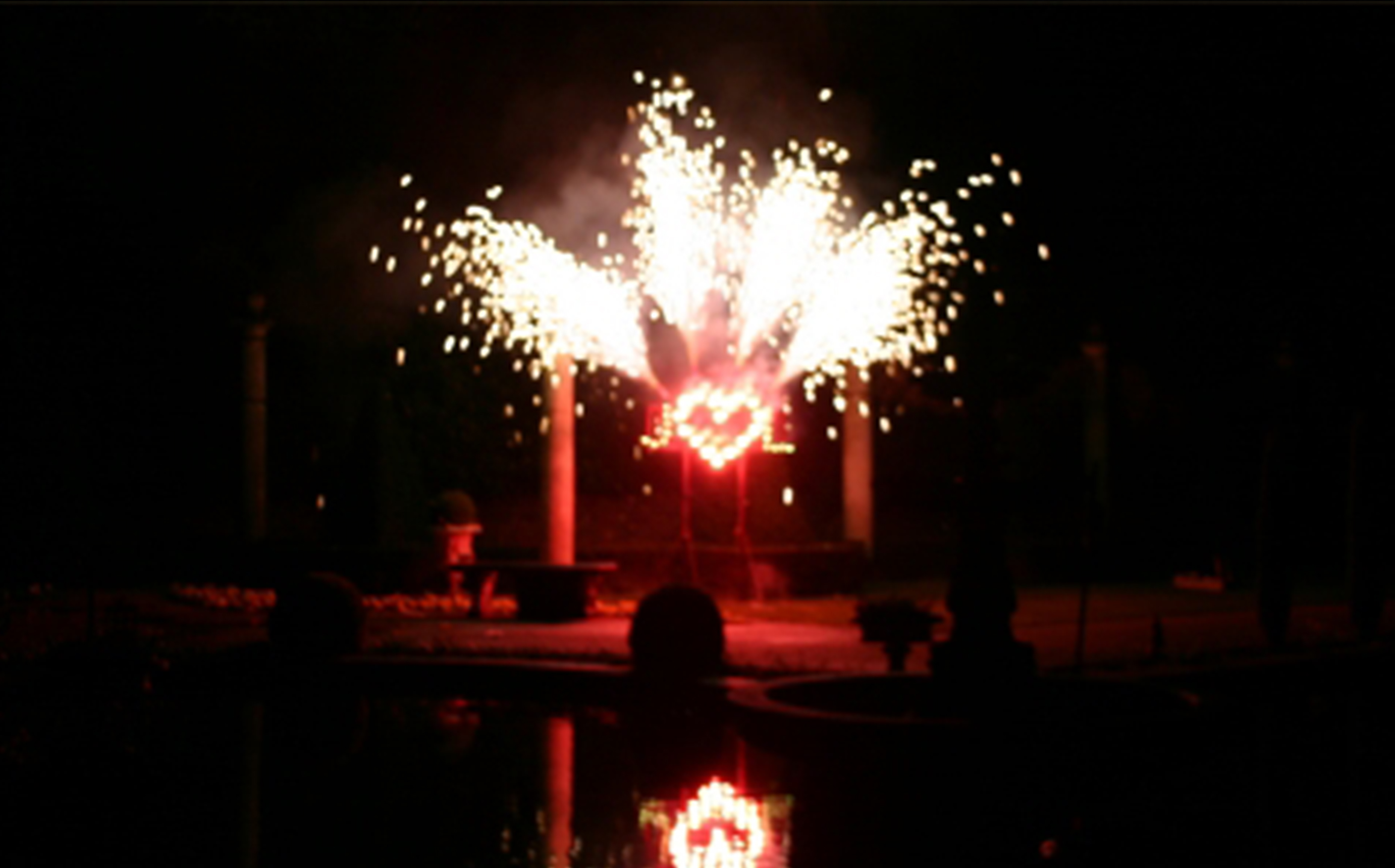 A Fireworks Solutions Limited wedding display, featuring a red heart for the happy couple